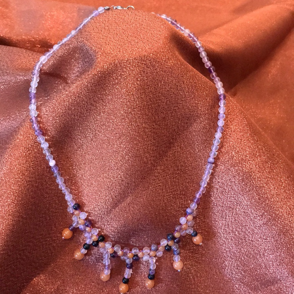 Purple beaded necklace with hanging details